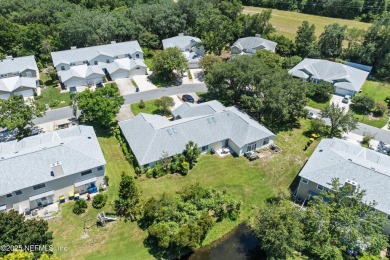 This charming one-story townhome offers easy living in the on Hidden Hills Country Club in Florida - for sale on GolfHomes.com, golf home, golf lot