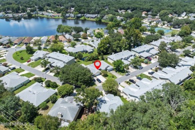 This charming one-story townhome offers easy living in the on Hidden Hills Country Club in Florida - for sale on GolfHomes.com, golf home, golf lot