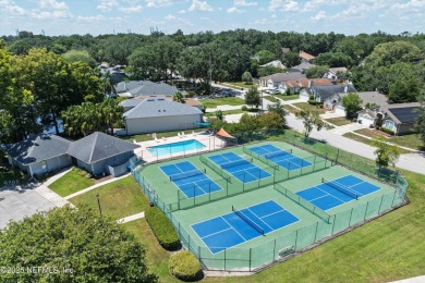 This charming one-story townhome offers easy living in the on Hidden Hills Country Club in Florida - for sale on GolfHomes.com, golf home, golf lot