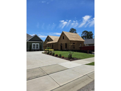 This new craftsman style 4 bedroom, 3 bath quality built luxury on Wild Wing Plantation in South Carolina - for sale on GolfHomes.com, golf home, golf lot