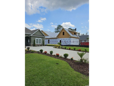 This new craftsman style 4 bedroom, 3 bath quality built luxury on Wild Wing Plantation in South Carolina - for sale on GolfHomes.com, golf home, golf lot