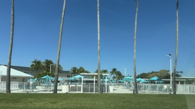 1st floor condo nestled in the vibrant 55+ community of Kings on Kings Point Golf -Flanders Way in Florida - for sale on GolfHomes.com, golf home, golf lot