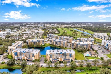 Welcome to this cool and impressive Golf Lake home with serene on East Bay Golf Club in Florida - for sale on GolfHomes.com, golf home, golf lot