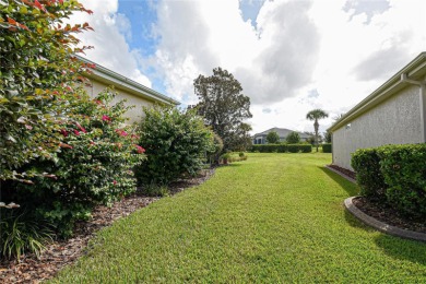 Discover your dream home in this exquisite 1936 sq. ft. Sanibel on Eagle Ridge At Spruce Creek Country Club in Florida - for sale on GolfHomes.com, golf home, golf lot