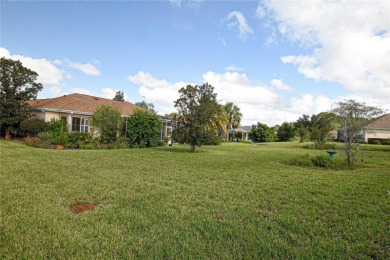 Discover your dream home in this exquisite 1936 sq. ft. Sanibel on Eagle Ridge At Spruce Creek Country Club in Florida - for sale on GolfHomes.com, golf home, golf lot