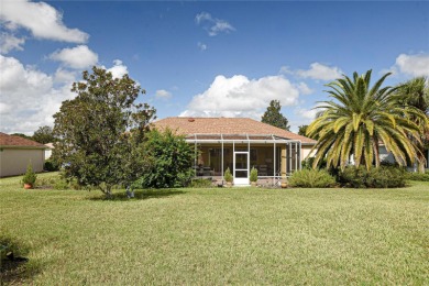 Discover your dream home in this exquisite 1936 sq. ft. Sanibel on Eagle Ridge At Spruce Creek Country Club in Florida - for sale on GolfHomes.com, golf home, golf lot