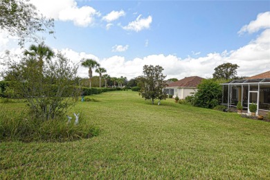 Discover your dream home in this exquisite 1936 sq. ft. Sanibel on Eagle Ridge At Spruce Creek Country Club in Florida - for sale on GolfHomes.com, golf home, golf lot