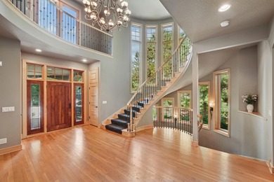 Tucked away at the end of a quiet cul-de-sac, this storybook on Bearpath Golf and Country Club in Minnesota - for sale on GolfHomes.com, golf home, golf lot