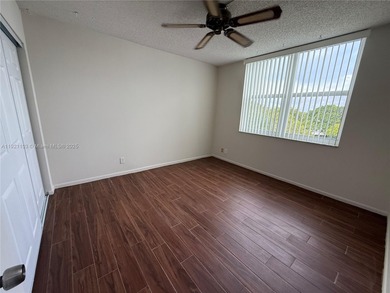 THIS BEAUTIFUL TWO BEDROOM TWO BATH CORNER UNIT, SPLIT BED ROOMS on Oriole Golf and Tennis Club in Florida - for sale on GolfHomes.com, golf home, golf lot