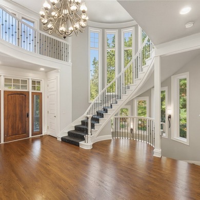 Tucked away at the end of a quiet cul-de-sac, this storybook on Bearpath Golf and Country Club in Minnesota - for sale on GolfHomes.com, golf home, golf lot