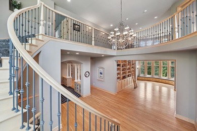 Tucked away at the end of a quiet cul-de-sac, this storybook on Bearpath Golf and Country Club in Minnesota - for sale on GolfHomes.com, golf home, golf lot