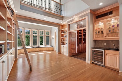 Tucked away at the end of a quiet cul-de-sac, this storybook on Bearpath Golf and Country Club in Minnesota - for sale on GolfHomes.com, golf home, golf lot