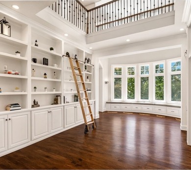 Tucked away at the end of a quiet cul-de-sac, this storybook on Bearpath Golf and Country Club in Minnesota - for sale on GolfHomes.com, golf home, golf lot