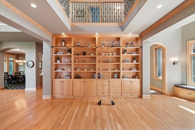 Tucked away at the end of a quiet cul-de-sac, this storybook on Bearpath Golf and Country Club in Minnesota - for sale on GolfHomes.com, golf home, golf lot