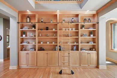 Tucked away at the end of a quiet cul-de-sac, this storybook on Bearpath Golf and Country Club in Minnesota - for sale on GolfHomes.com, golf home, golf lot