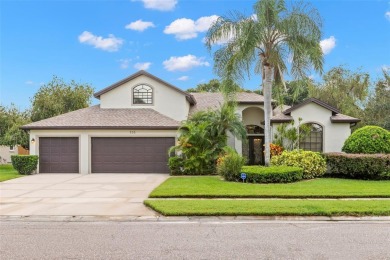 Nestled within the prestigious gated community of East Lake on East Lake Woodlands Country Club in Florida - for sale on GolfHomes.com, golf home, golf lot