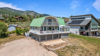 Come see this fully furnished, updated, rustic cabin in on Bear Lake West Golf and Country Club in Idaho - for sale on GolfHomes.com, golf home, golf lot