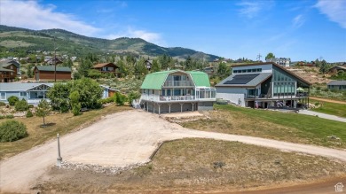 Come see this fully furnished, updated, rustic cabin in on Bear Lake West Golf and Country Club in Idaho - for sale on GolfHomes.com, golf home, golf lot