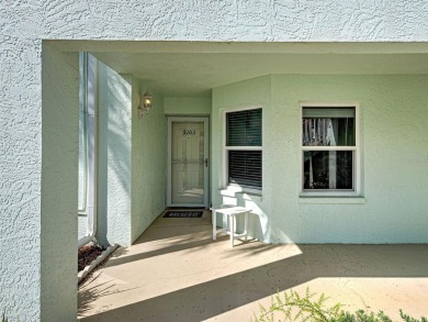 Enjoy peaceful canal views and Florida living at its finest in on Sabal Trace Golf and Country Club in Florida - for sale on GolfHomes.com, golf home, golf lot