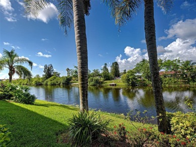 Enjoy peaceful canal views and Florida living at its finest in on Sabal Trace Golf and Country Club in Florida - for sale on GolfHomes.com, golf home, golf lot