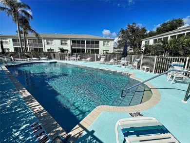 Enjoy peaceful canal views and Florida living at its finest in on Sabal Trace Golf and Country Club in Florida - for sale on GolfHomes.com, golf home, golf lot