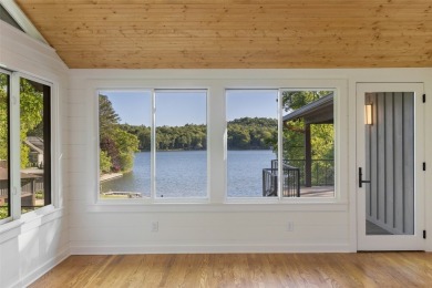 Welcome to an extraordinary lakefront estate on Lake Toxaway on Lake Toxaway Country Club in North Carolina - for sale on GolfHomes.com, golf home, golf lot