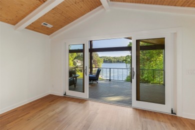 Welcome to an extraordinary lakefront estate on Lake Toxaway on Lake Toxaway Country Club in North Carolina - for sale on GolfHomes.com, golf home, golf lot