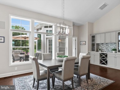 The welcoming covered entry of 33437 Islander Drive invites you on The Peninsula Golf and Country Club in Delaware - for sale on GolfHomes.com, golf home, golf lot