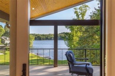 Welcome to an extraordinary lakefront estate on Lake Toxaway on Lake Toxaway Country Club in North Carolina - for sale on GolfHomes.com, golf home, golf lot