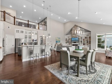 The welcoming covered entry of 33437 Islander Drive invites you on The Peninsula Golf and Country Club in Delaware - for sale on GolfHomes.com, golf home, golf lot