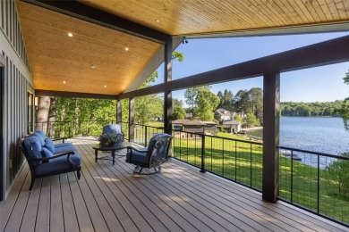 Welcome to an extraordinary lakefront estate on Lake Toxaway on Lake Toxaway Country Club in North Carolina - for sale on GolfHomes.com, golf home, golf lot