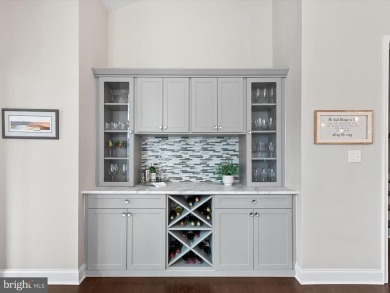 The welcoming covered entry of 33437 Islander Drive invites you on The Peninsula Golf and Country Club in Delaware - for sale on GolfHomes.com, golf home, golf lot