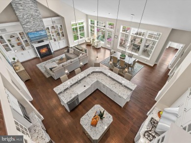 The welcoming covered entry of 33437 Islander Drive invites you on The Peninsula Golf and Country Club in Delaware - for sale on GolfHomes.com, golf home, golf lot