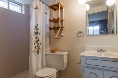 Welcome to this bright  inviting 4-bedroom, 3-bathroom home on Olive Glenn Golf and Country Club in Wyoming - for sale on GolfHomes.com, golf home, golf lot