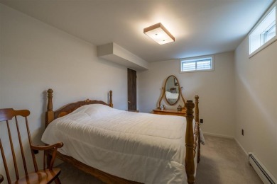 Welcome to this bright  inviting 4-bedroom, 3-bathroom home on Olive Glenn Golf and Country Club in Wyoming - for sale on GolfHomes.com, golf home, golf lot