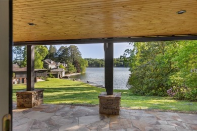Welcome to an extraordinary lakefront estate on Lake Toxaway on Lake Toxaway Country Club in North Carolina - for sale on GolfHomes.com, golf home, golf lot