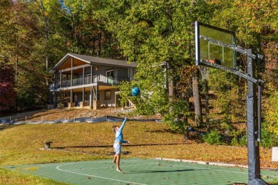 Welcome to an extraordinary lakefront estate on Lake Toxaway on Lake Toxaway Country Club in North Carolina - for sale on GolfHomes.com, golf home, golf lot