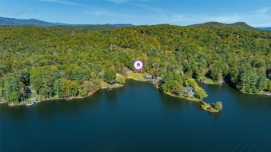 Welcome to an extraordinary lakefront estate on Lake Toxaway on Lake Toxaway Country Club in North Carolina - for sale on GolfHomes.com, golf home, golf lot