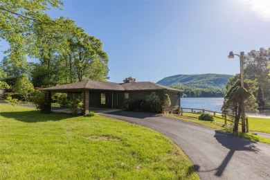 Welcome to an extraordinary lakefront estate on Lake Toxaway on Lake Toxaway Country Club in North Carolina - for sale on GolfHomes.com, golf home, golf lot