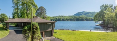 Welcome to an extraordinary lakefront estate on Lake Toxaway on Lake Toxaway Country Club in North Carolina - for sale on GolfHomes.com, golf home, golf lot