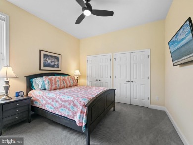 The welcoming covered entry of 33437 Islander Drive invites you on The Peninsula Golf and Country Club in Delaware - for sale on GolfHomes.com, golf home, golf lot