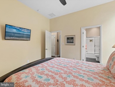 The welcoming covered entry of 33437 Islander Drive invites you on The Peninsula Golf and Country Club in Delaware - for sale on GolfHomes.com, golf home, golf lot