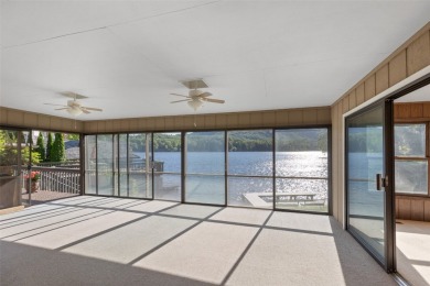 Welcome to an extraordinary lakefront estate on Lake Toxaway on Lake Toxaway Country Club in North Carolina - for sale on GolfHomes.com, golf home, golf lot