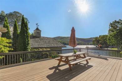 Welcome to an extraordinary lakefront estate on Lake Toxaway on Lake Toxaway Country Club in North Carolina - for sale on GolfHomes.com, golf home, golf lot