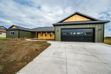 This beautiful new home in the Powder Horn Golf Community offers on The Powder Horn Golf Club - Mountain in Wyoming - for sale on GolfHomes.com, golf home, golf lot