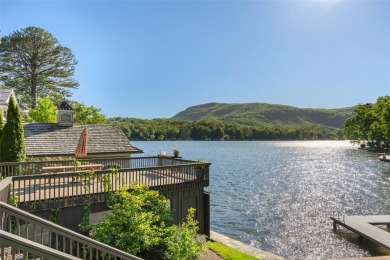 Welcome to an extraordinary lakefront estate on Lake Toxaway on Lake Toxaway Country Club in North Carolina - for sale on GolfHomes.com, golf home, golf lot