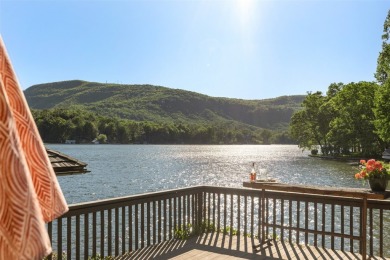 Welcome to an extraordinary lakefront estate on Lake Toxaway on Lake Toxaway Country Club in North Carolina - for sale on GolfHomes.com, golf home, golf lot