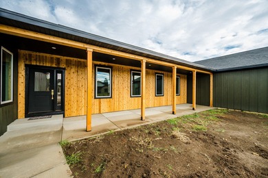 This beautiful new home in the Powder Horn Golf Community offers on The Powder Horn Golf Club - Mountain in Wyoming - for sale on GolfHomes.com, golf home, golf lot