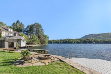Welcome to an extraordinary lakefront estate on Lake Toxaway on Lake Toxaway Country Club in North Carolina - for sale on GolfHomes.com, golf home, golf lot