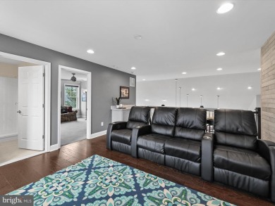 The welcoming covered entry of 33437 Islander Drive invites you on The Peninsula Golf and Country Club in Delaware - for sale on GolfHomes.com, golf home, golf lot